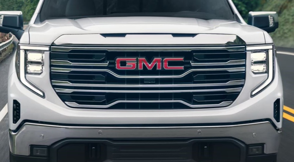 The grille on a white 2025 GMC Sierra 1500.