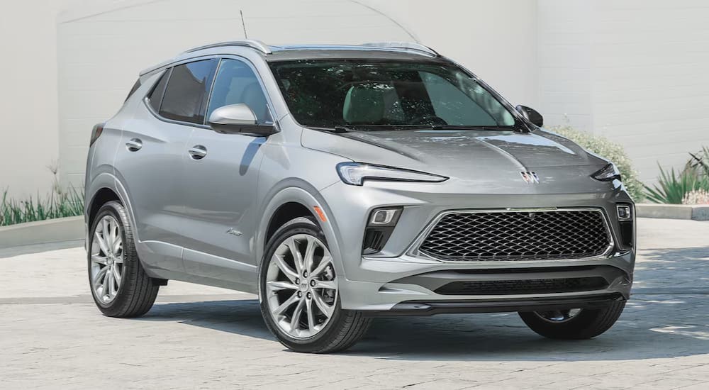 A silver 2025 Buick Encore GX Avenir parked on a sunny day.