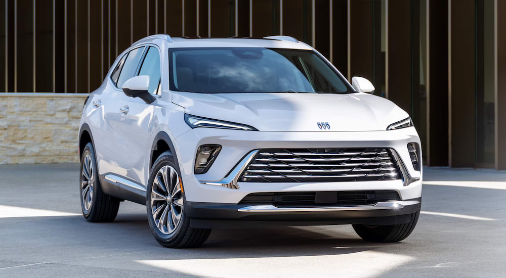 White 2025 Buick Envision parked on pavement.