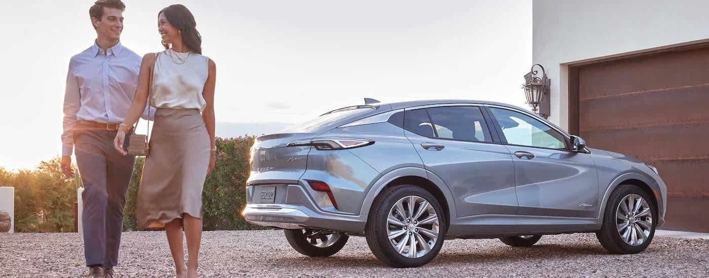 A silver 2024 Buick Envista is parked in a driveway.