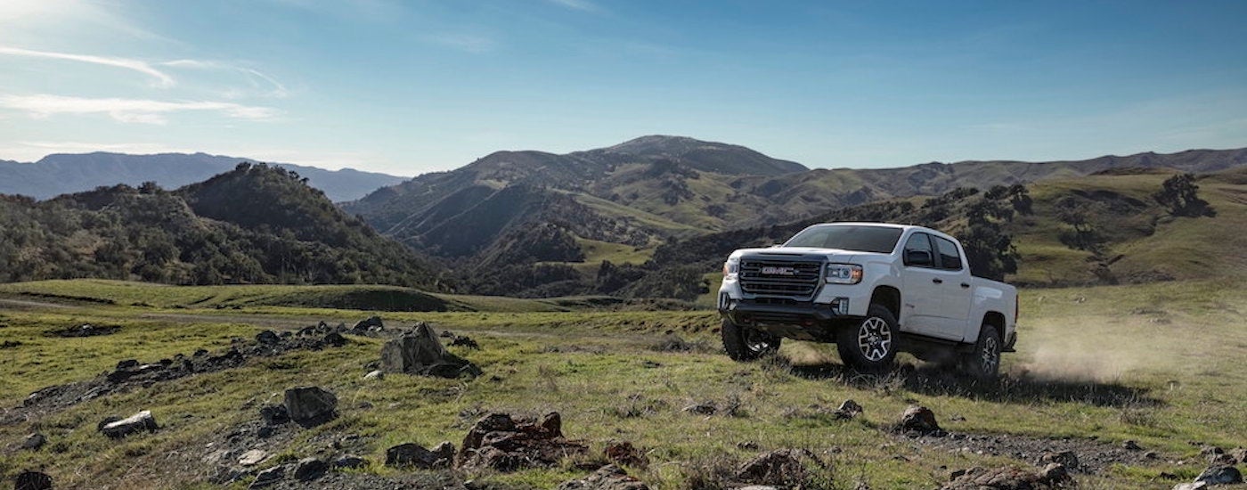 A white 2022 GMC Canyon from the front.